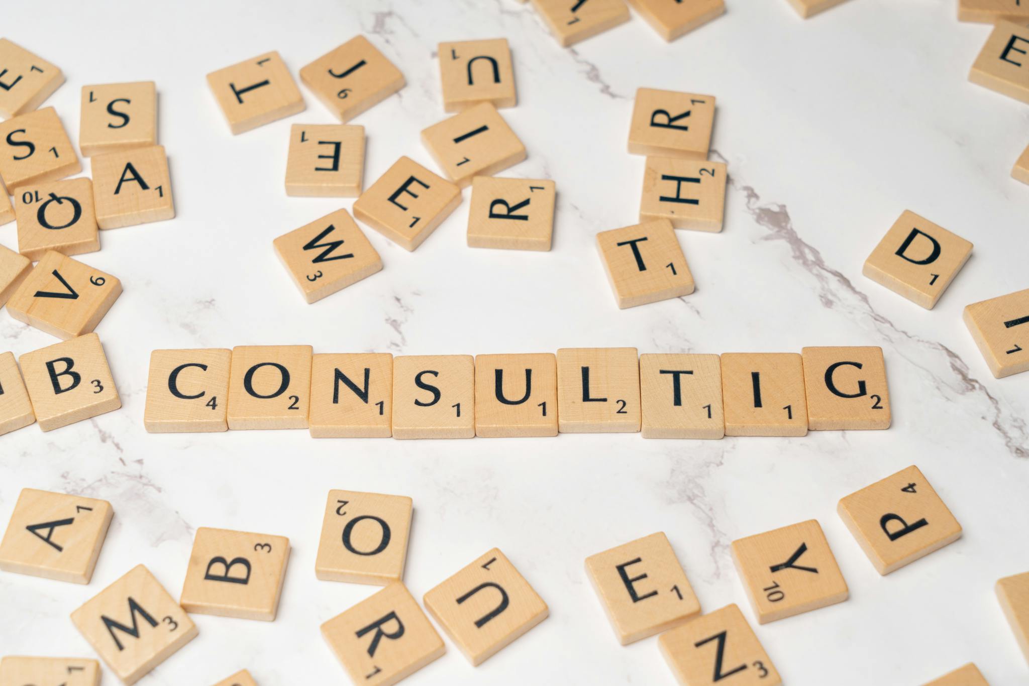 Letters with the word Consulting